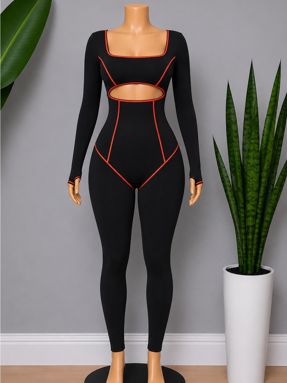 Black Long-Sleeve Cutout Jumpsuit with Orange Piping